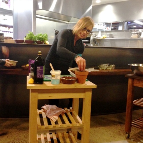 Teresa Cutter preparing her edible Flower Pot Salad